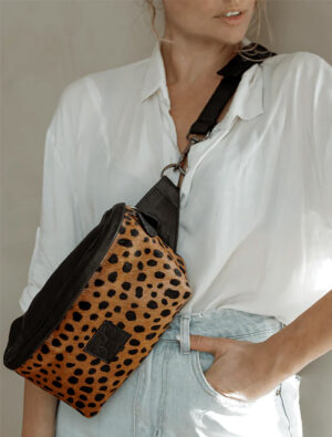 Model wears a cross body bag