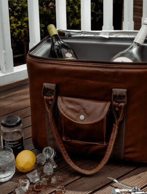 Thandana leather cooler bag with products